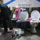Ukrainian activists bring what they called as Humanitarian aid for Russians during the prank rally in front of the Russian embassy in Kyiv, Ukraine, 25 November 2019.